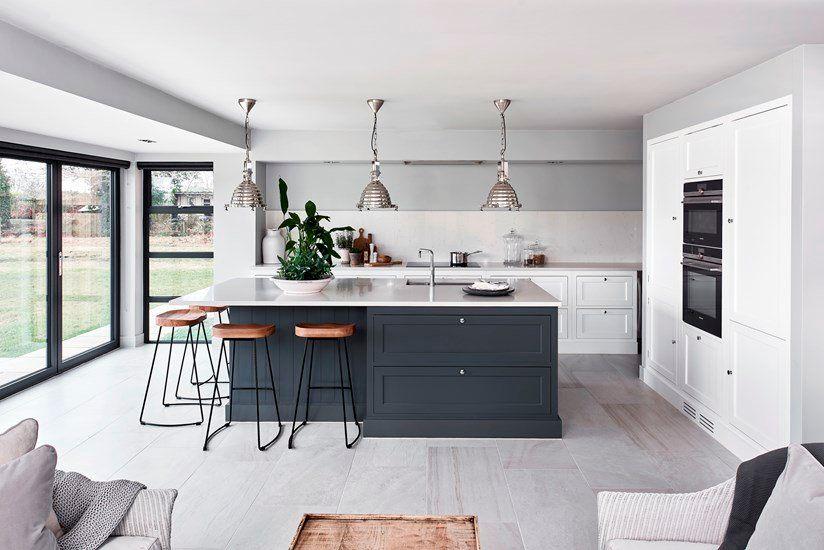 A grey and white modern kitchen, showcasing the Henley Neptune collection, sold by hunters furniture